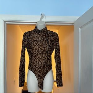 This Fashion Nova bodysuit. Size L